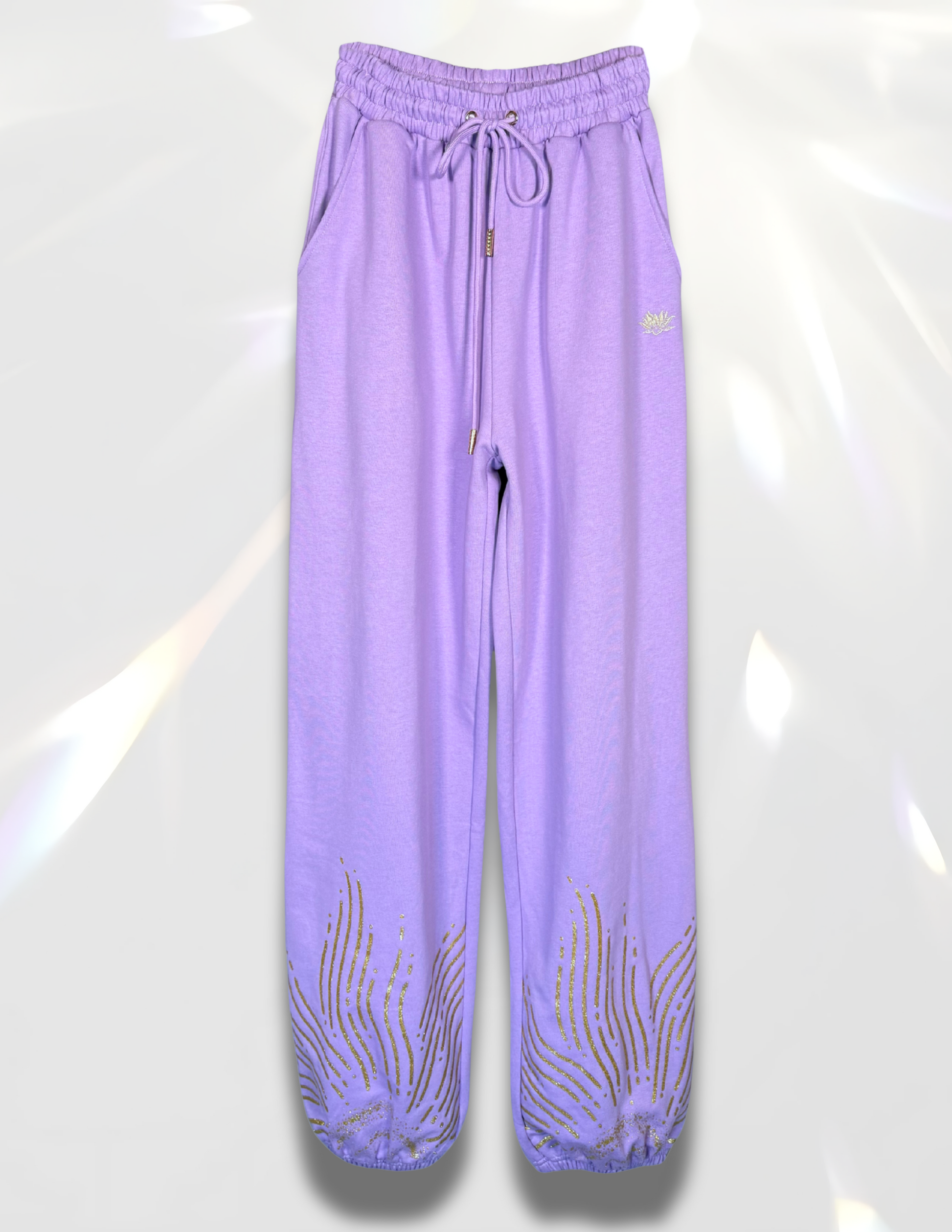 Oversized sweatpants with gold sparkle printed details pants by Spicy Bloom.
