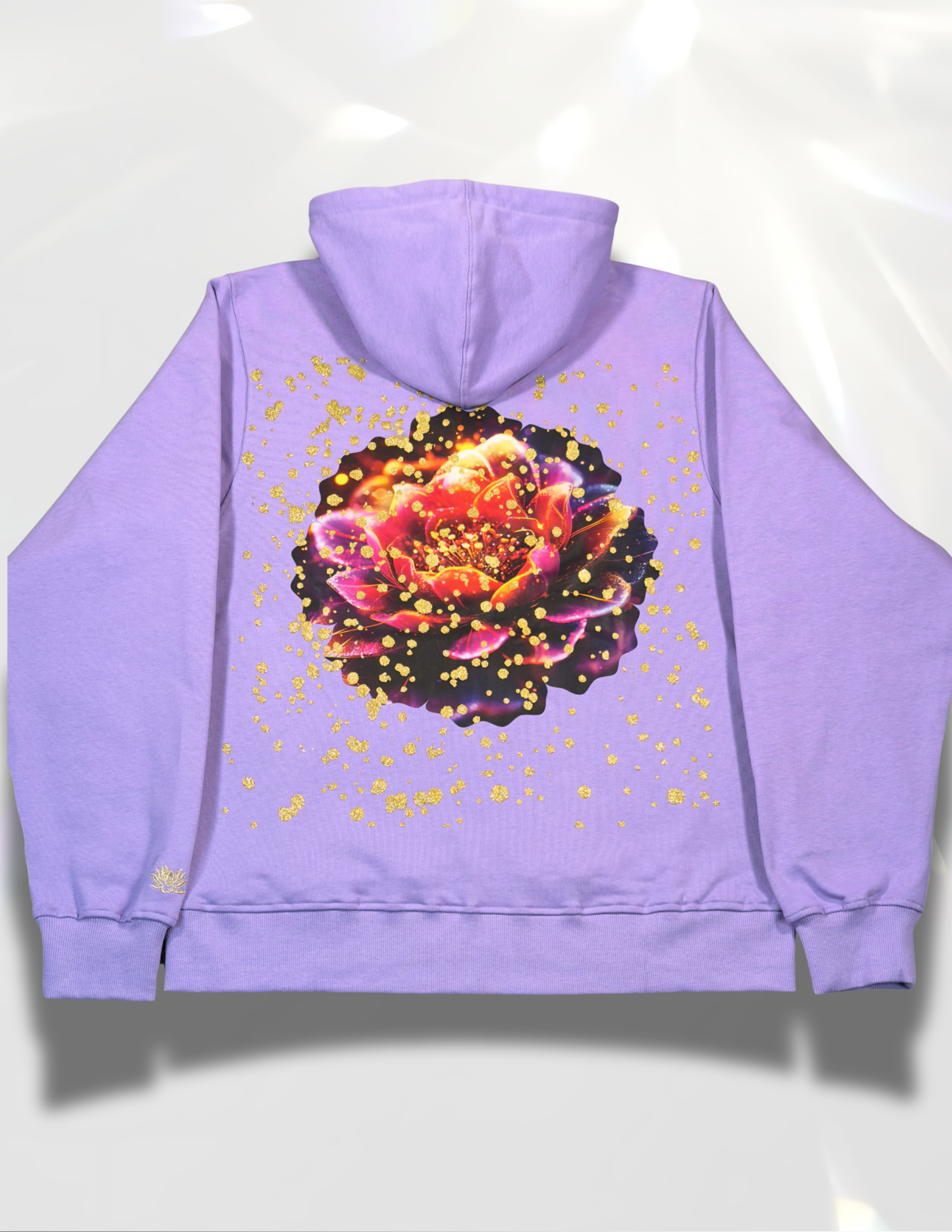 oversized hoodie with golden glitter print on top of large colorful lotus DTF print back view