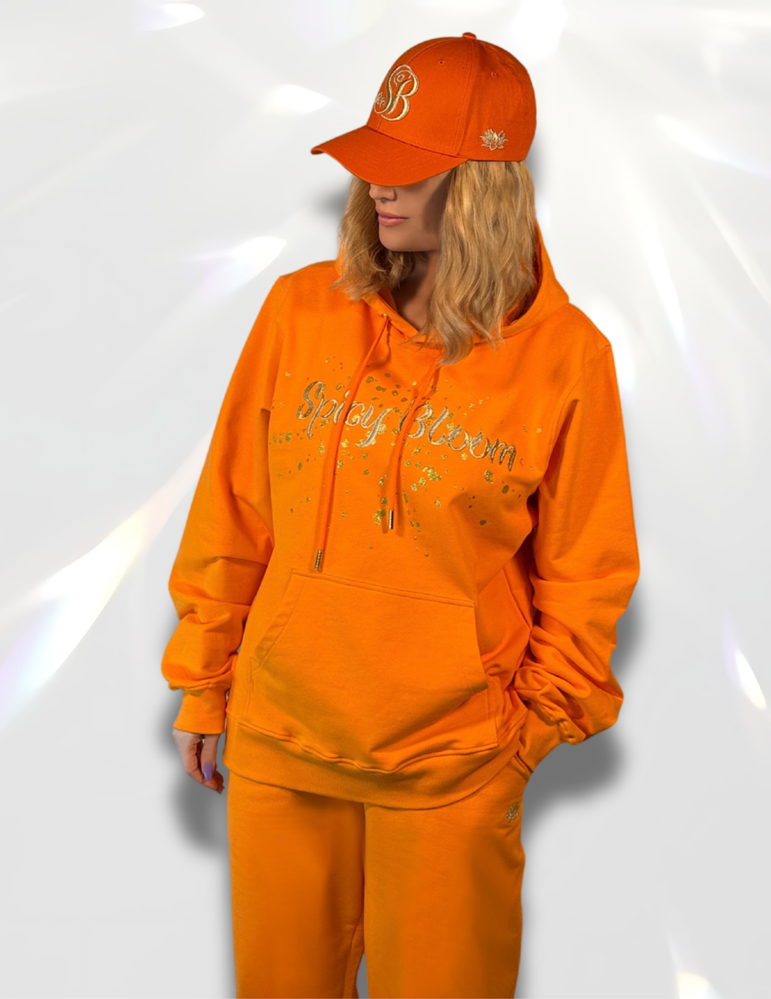 Gold metallic crewneck hoodie large DTF print styled with matching pants and hat – Spicy Bloom Signature Set.