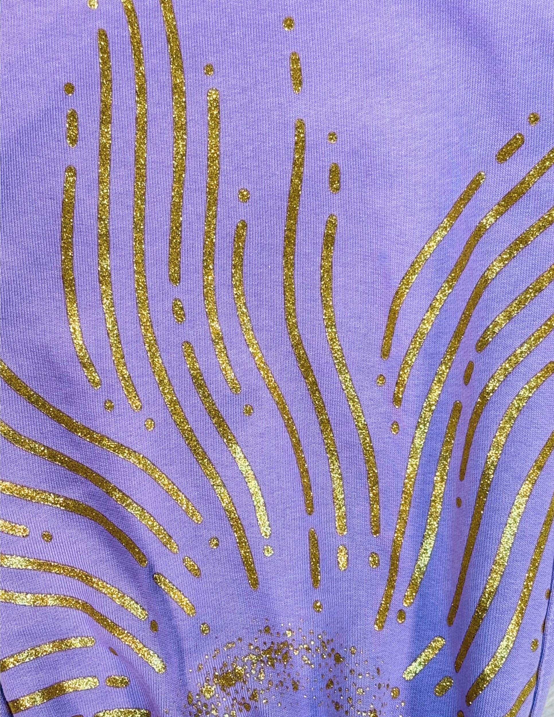 Sweatpants with gold glitter printed details by Spicy Bloom.